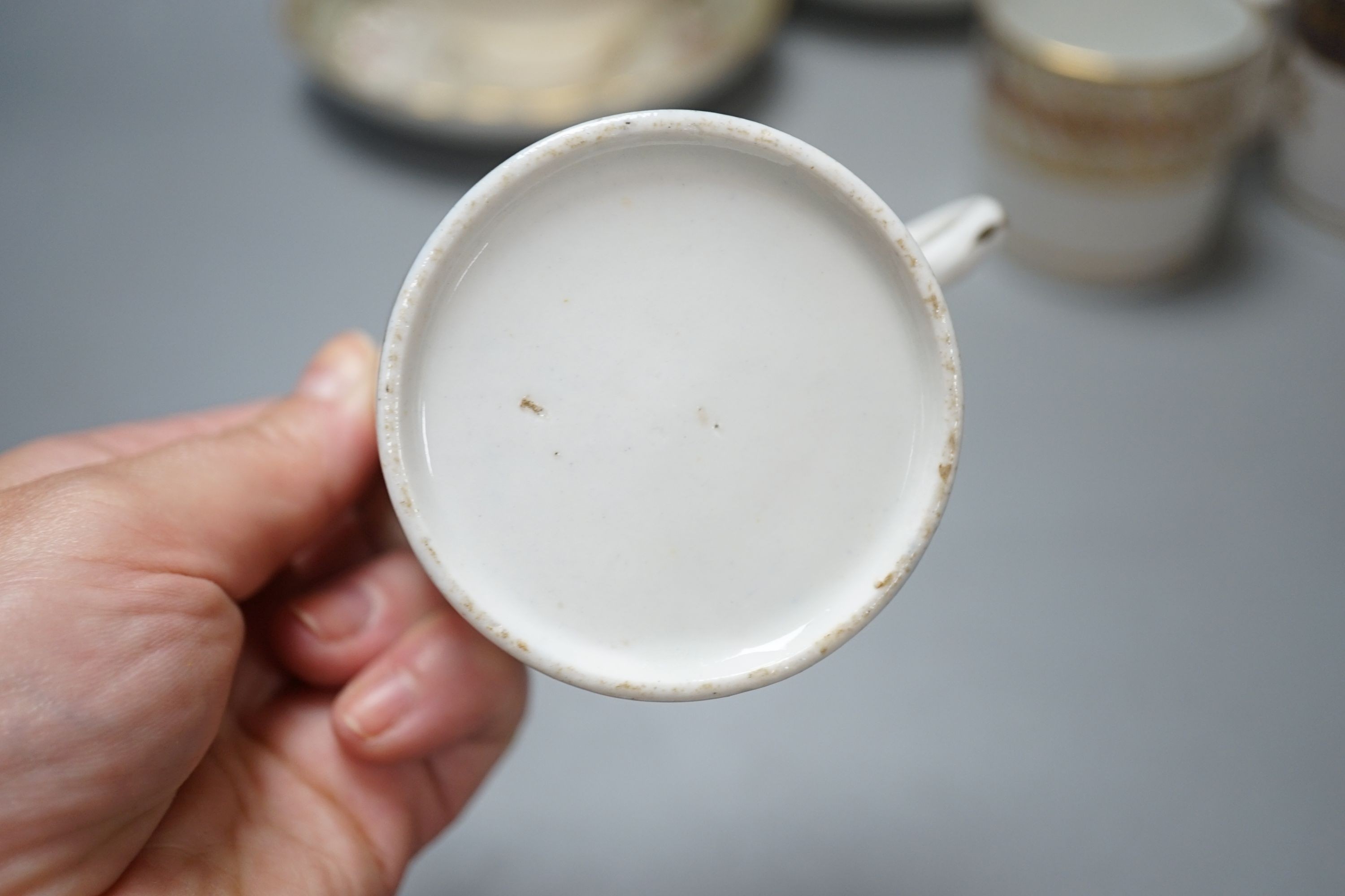 Four Regency porcelain coffee cans and a pair of trios (8)